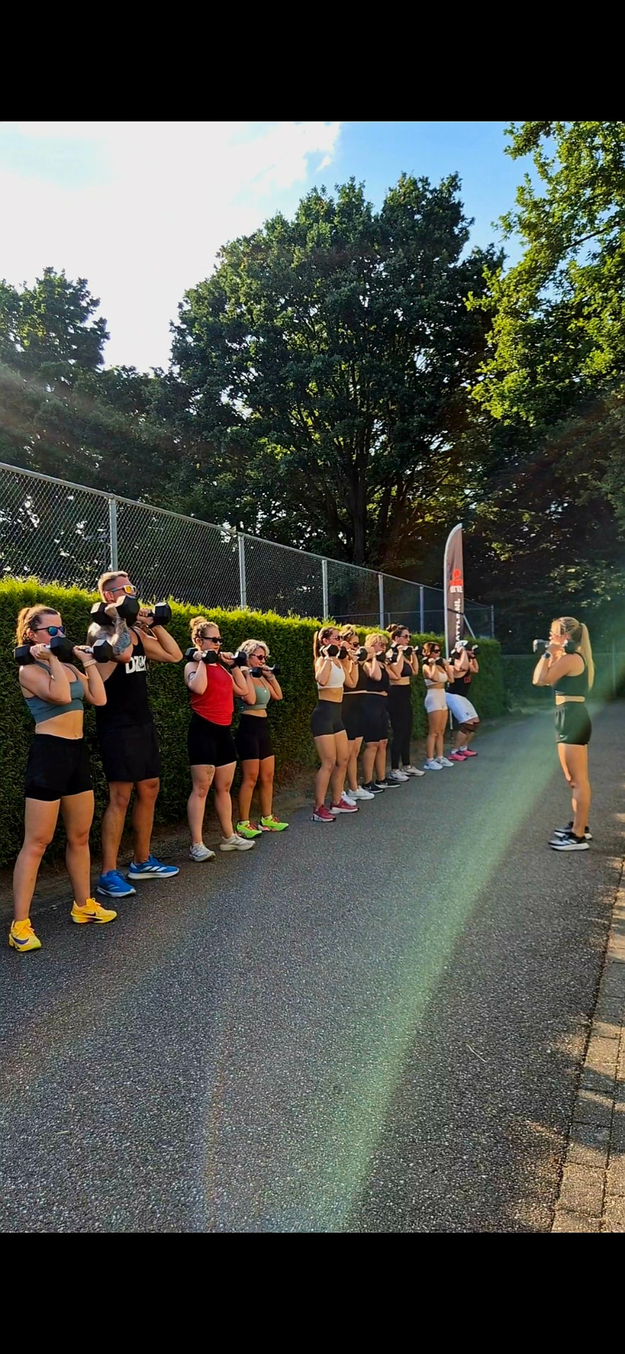 Hybride Sports athletes training together outdoors